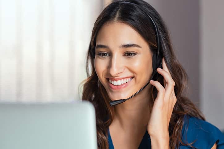 Call center operator with headphones